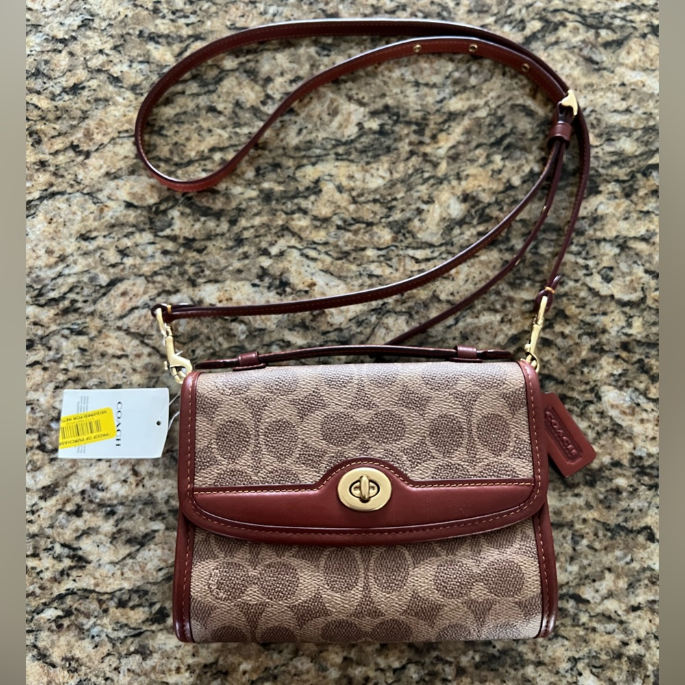 Kip Turnlock Crossbody In Signature Canvas